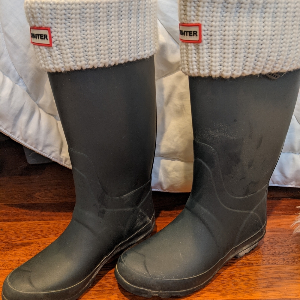 Tall hunter rain boots with socks